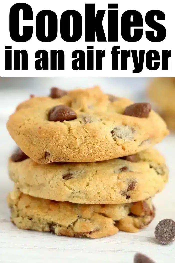 A stack of three chocolate chip air fryer cookies sits on a white surface. The text above reads, "Cookies in an air fryer.