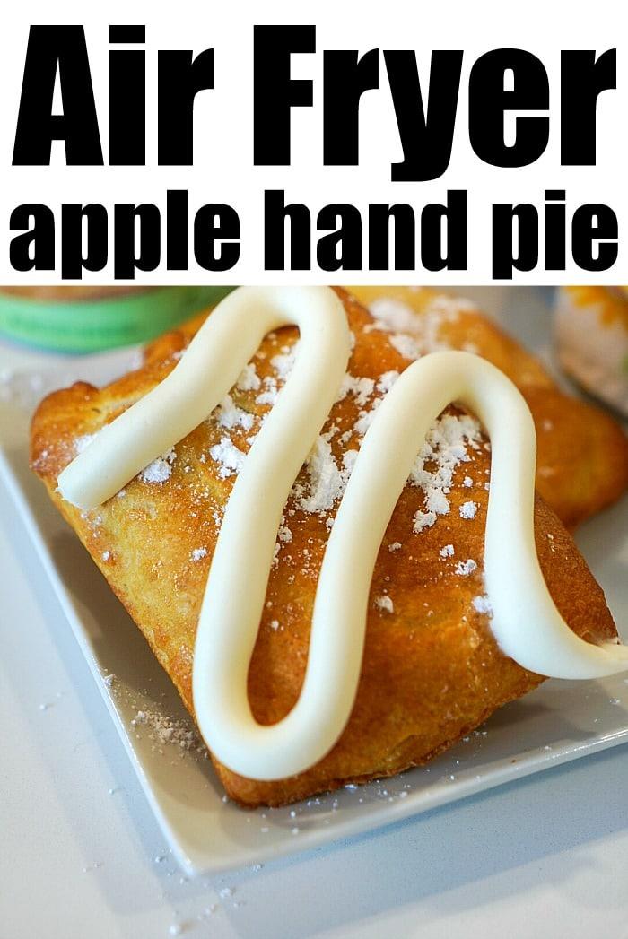 A close-up of an air-fried apple hand pie with icing drizzled on top, reminiscent of sweet air fryer dumplings.