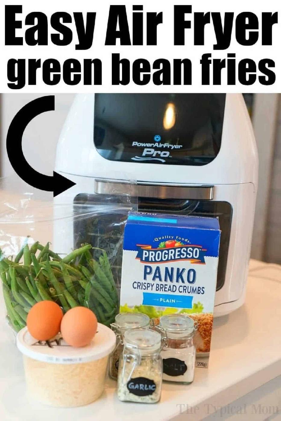 Air Fryer Green Bean Fries made with crisp green beans, eggs, Panko bread crumbs, Parmesan, garlic powder, and onion powder are arranged on a counter—perfect for a healthy and delicious snack.