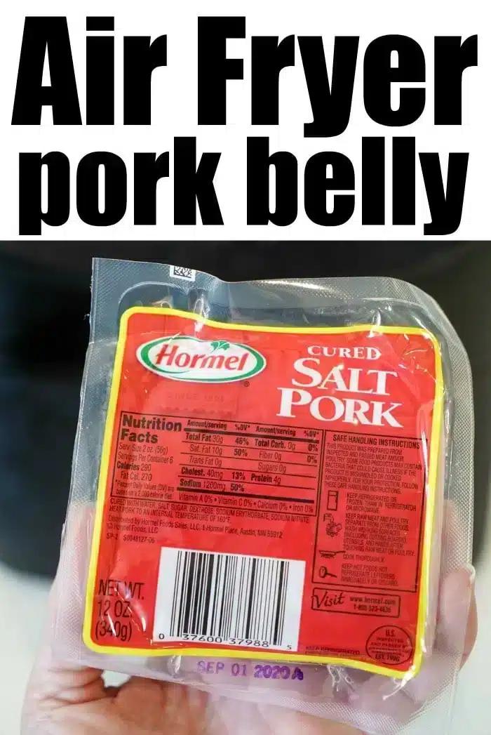 A hand holds a pack of Hormel cured salt pork, perfect for making air fryer pork belly. The packaging displays nutritional facts and a barcode. The text above the image reads "Air Fryer pork belly" in bold black letters. The expiration date on the package is September 01, 2023.
