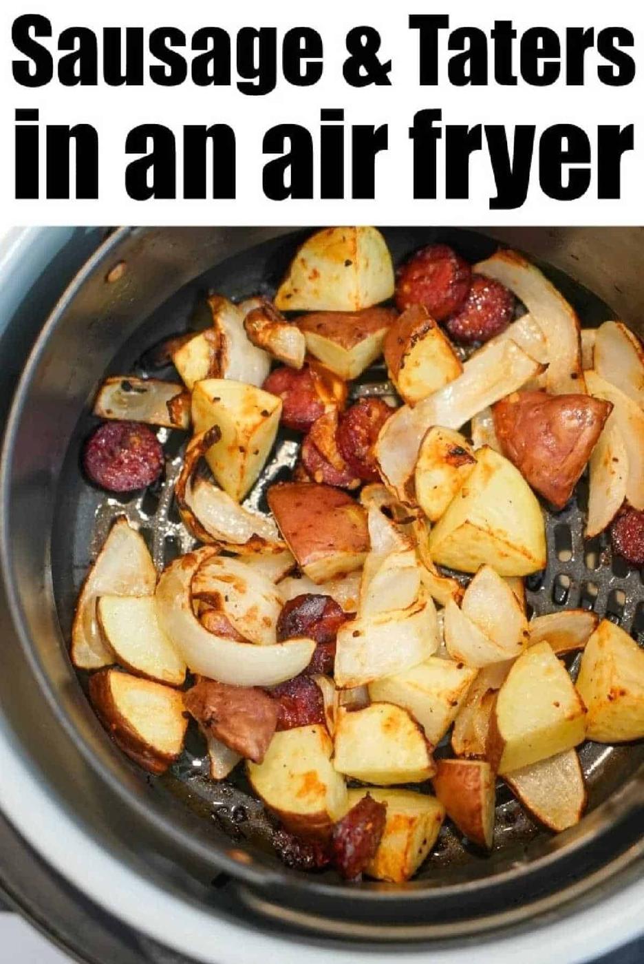 Air fryer sausage, potatoes, and onions are chopped and cooked to perfection in an air fryer basket for a quick and delicious meal.