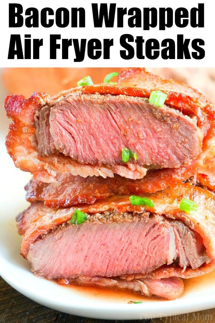 Sliced bacon-wrapped air fryer steaks cooked to perfection, topped with fresh green onions and beautifully presented on a plate.