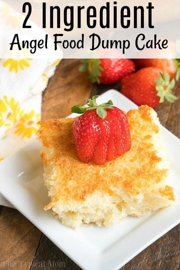 A slice of pineapple angel food dump cake topped with sliced strawberries rests on a white plate, accompanied by a yellow flower-patterned cloth.