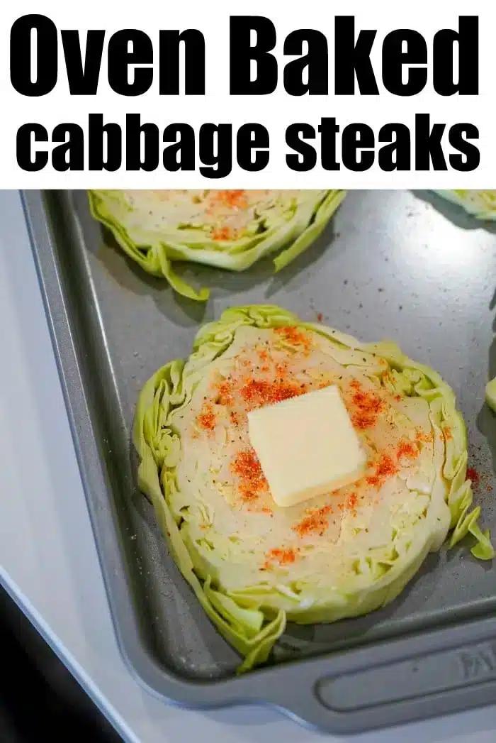 A close-up of baked cabbage steaks on a baking sheet, each topped with a pat of butter and sprinkled with seasoning. The text "Oven Baked cabbage steaks" is displayed at the top of the image.