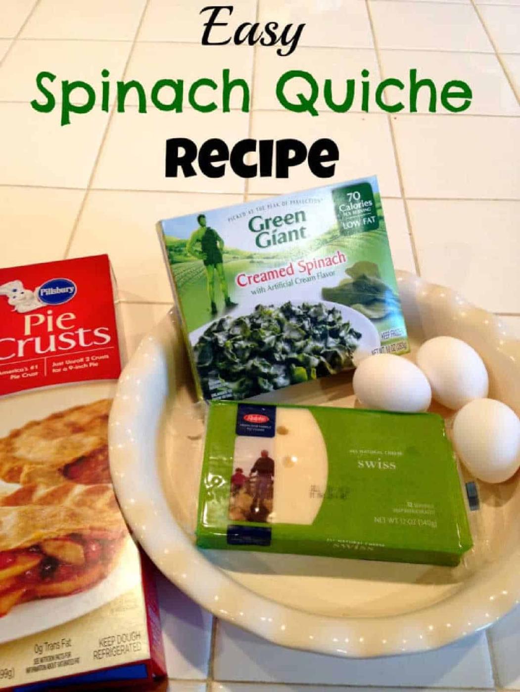 Pie crusts, creamed spinach, Swiss cheese, and three eggs are ready on the counter—perfect ingredients for an easy mini quiche recipe.