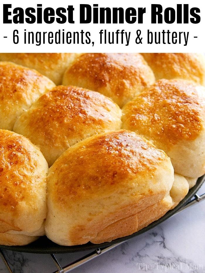 Close-up of a tray of golden-brown dinner rolls, boasting a fluffy, buttery texture with just 6 ingredients. This easy roll recipe will effortlessly elevate any meal.
