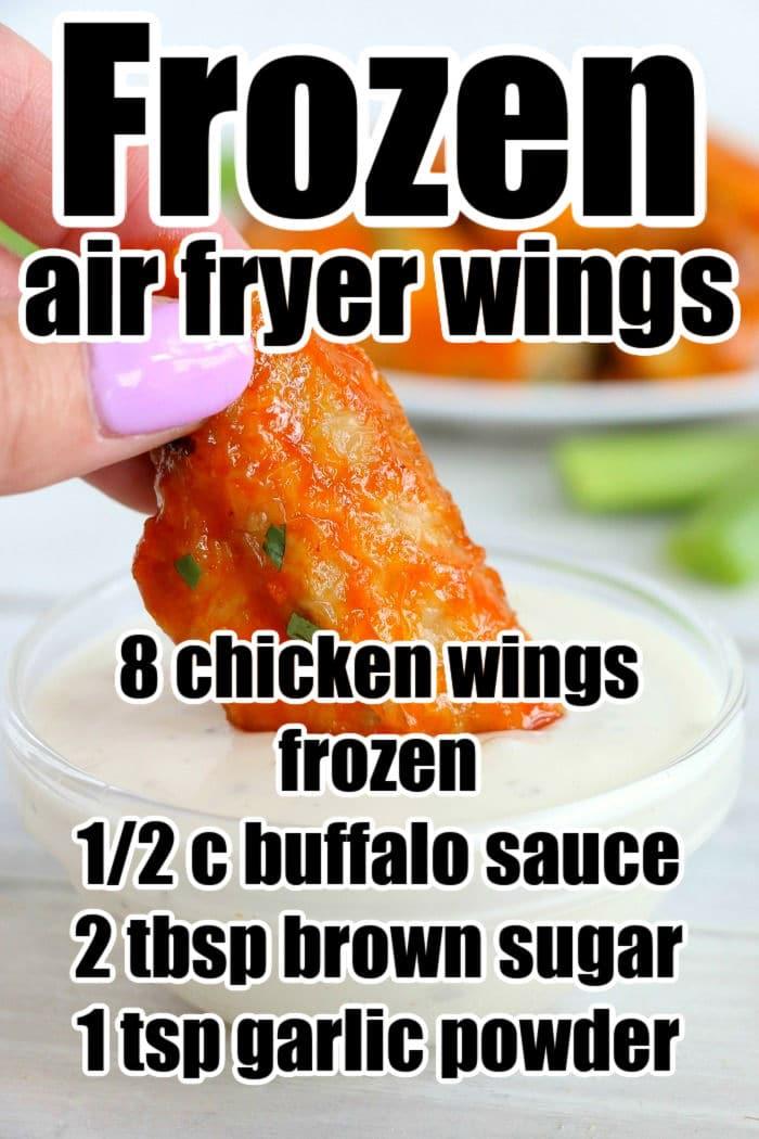 Close-up of a hand dipping a buffalo chicken wing into sauce. Discover the ultimate air fryer recipe for turning frozen chicken wings into crispy, savory bites.