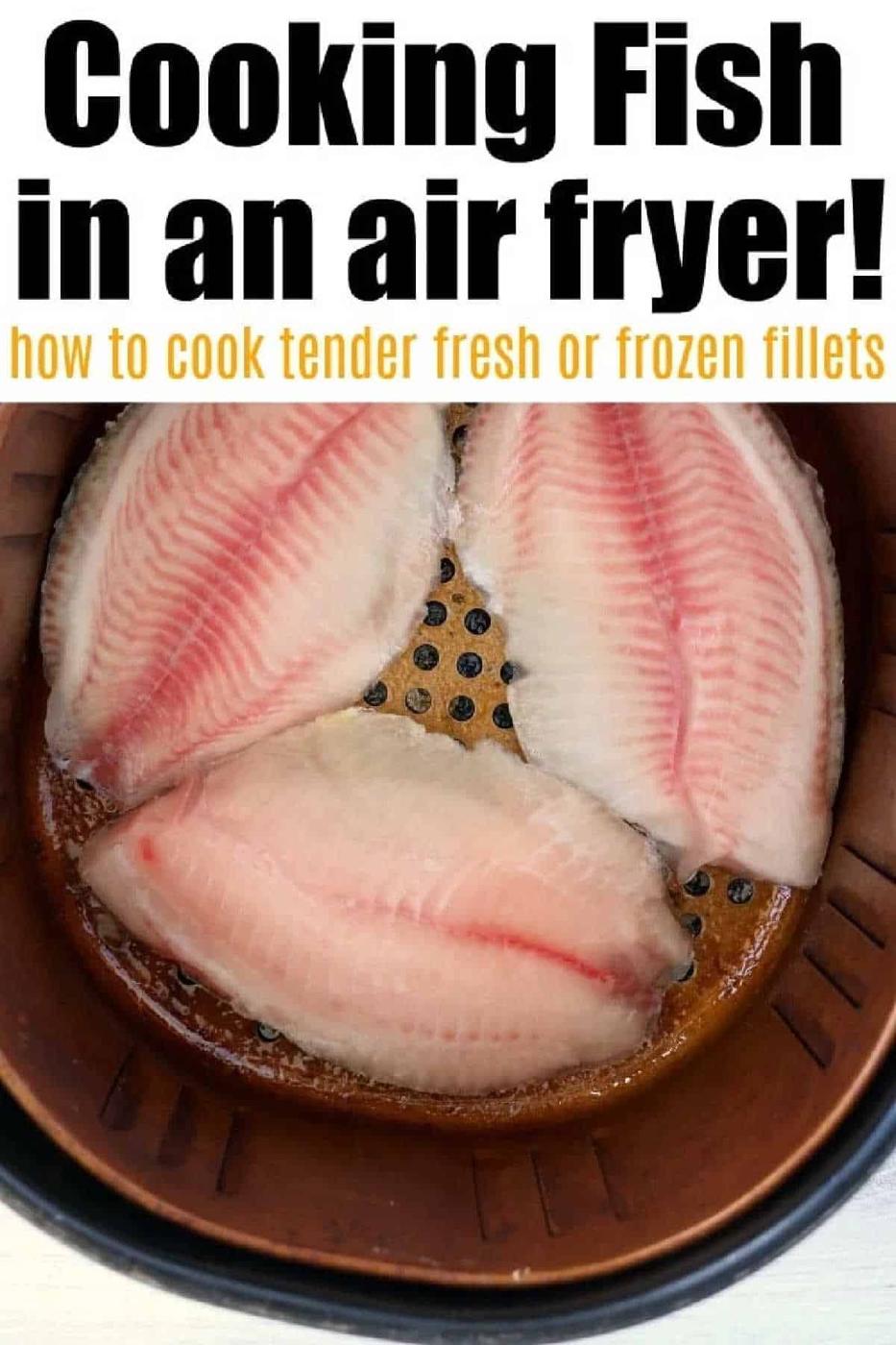 Three raw fish fillets, perfect for making frozen fish in air fryer, are placed in the air fryer basket, ready to be cooked.