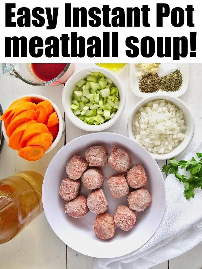 Ingredients for Instant Pot meatball soup, including savory meatballs, chopped veggies, broth, and seasonings, are displayed on a white table.