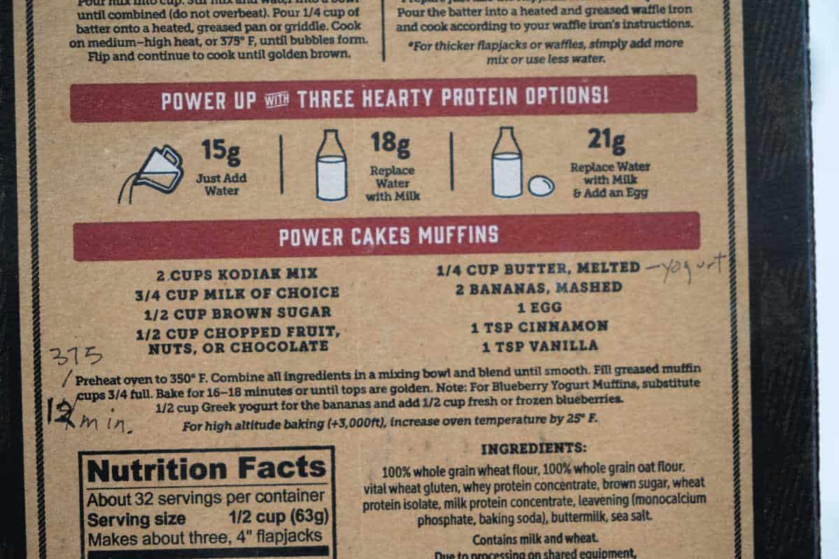 Recipe instructions for Kodiak Power Cakes Banana Muffins with handwritten notes, including bake time and temperature.