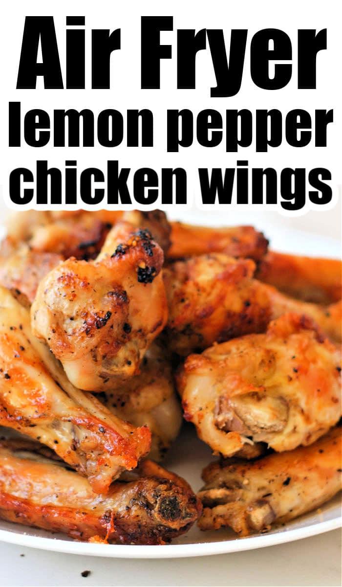 A plate of golden brown wings, seasoned to perfection, is piled high. The text "Lemon Pepper Chicken Wings Air Fryer" stands proudly above, highlighting the deliciously crispy creation.