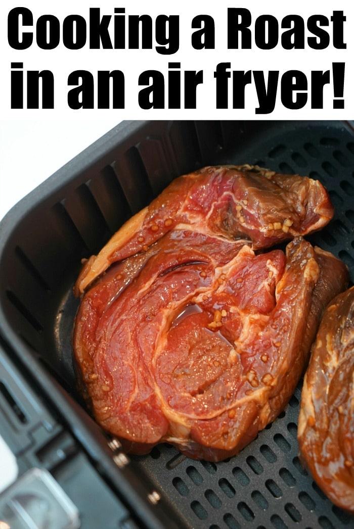 Raw seasoned roast meat pieces are snugly nestled in an air fryer basket. At the top, bold text proclaims, "Mastering the Air Fryer Roast!