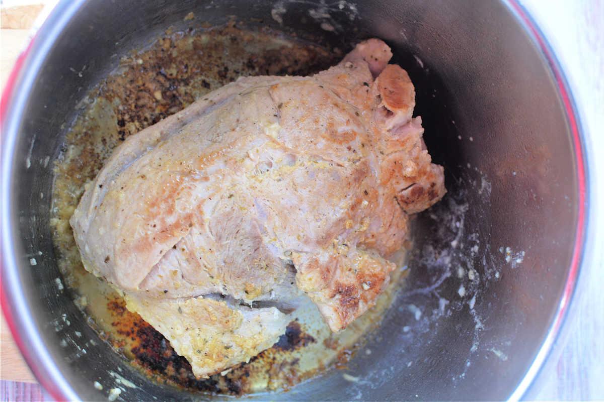 Savor the succulent flavors of a perfectly cooked pork sirloin roast, seasoned to perfection and simmered in its own savory juices.