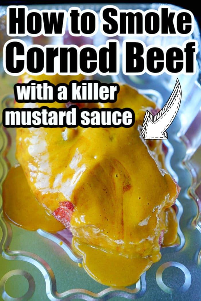 Corned beef covered in mustard sauce with text overlay: How to Smoke Traeger Corned Beef with a killer mustard sauce.