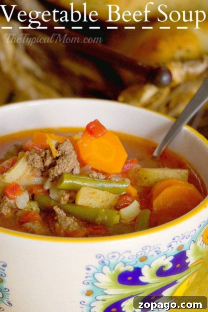 Meatloaf Reinvented 4 A bowl of instant pot vegetable beef soup with carrots, green beans, and tomatoes.