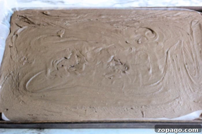 Decadent Dark Chocolate Fudge 4 Hand-shaped dark chocolate 'coal' pieces on a plate, ready for gifting