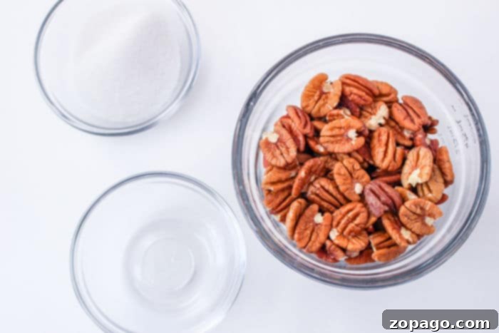 Sweet & Crunchy Pecans 3 Quick Candied Pecans cooling on parchment paper.