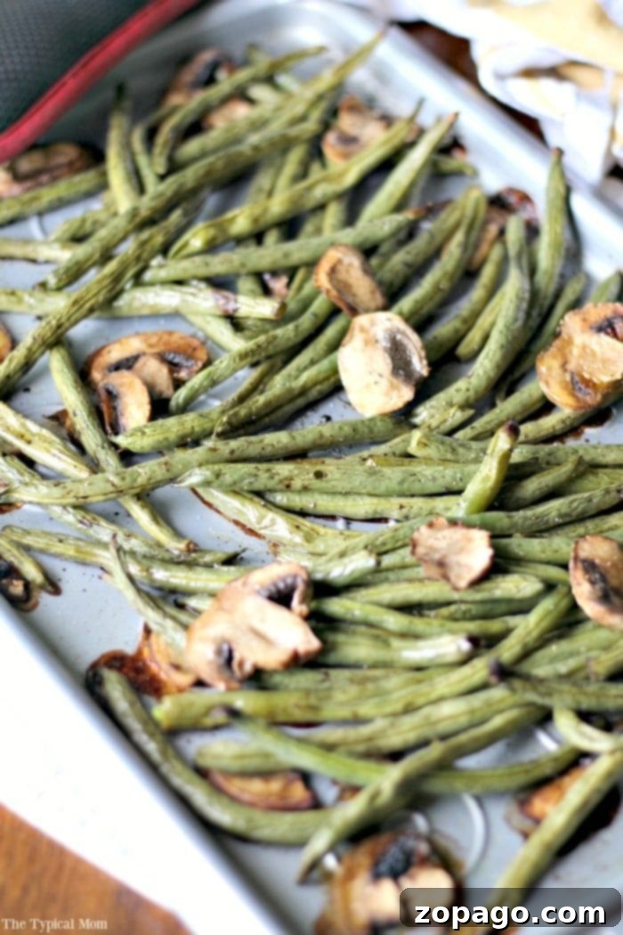 Elevate Your Frozen Green Beans 3 Sheet pan green beans and sliced mushrooms roasted to perfection.
