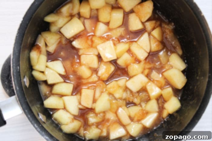 Crispy Air Fryer Apple Pie Egg Rolls 4 Homemade apple pie filling, rich and spiced, ready for air fryer egg rolls.