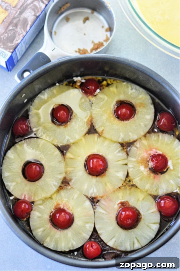 Sunshine Pineapple Upside Down Cake with Yellow Mix 5 Grandmas Pineapple Upside Down Cake - showing the beautiful inverted cake on a plate