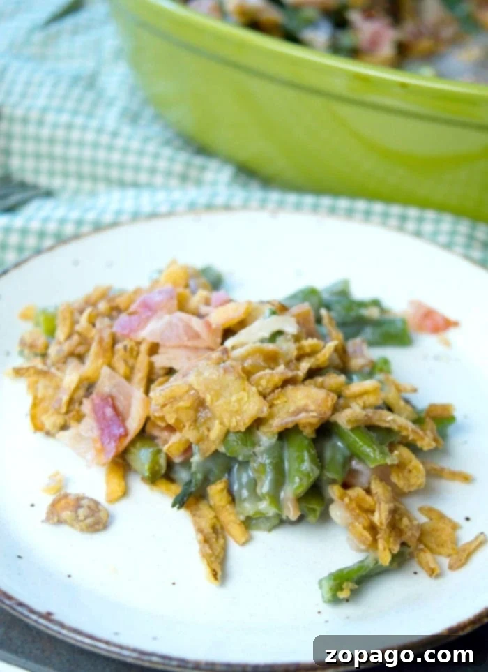 Delicious Green Bean Casserole with Crispy Bacon Easy Green Bean Casserole with Bacon, ready to serve