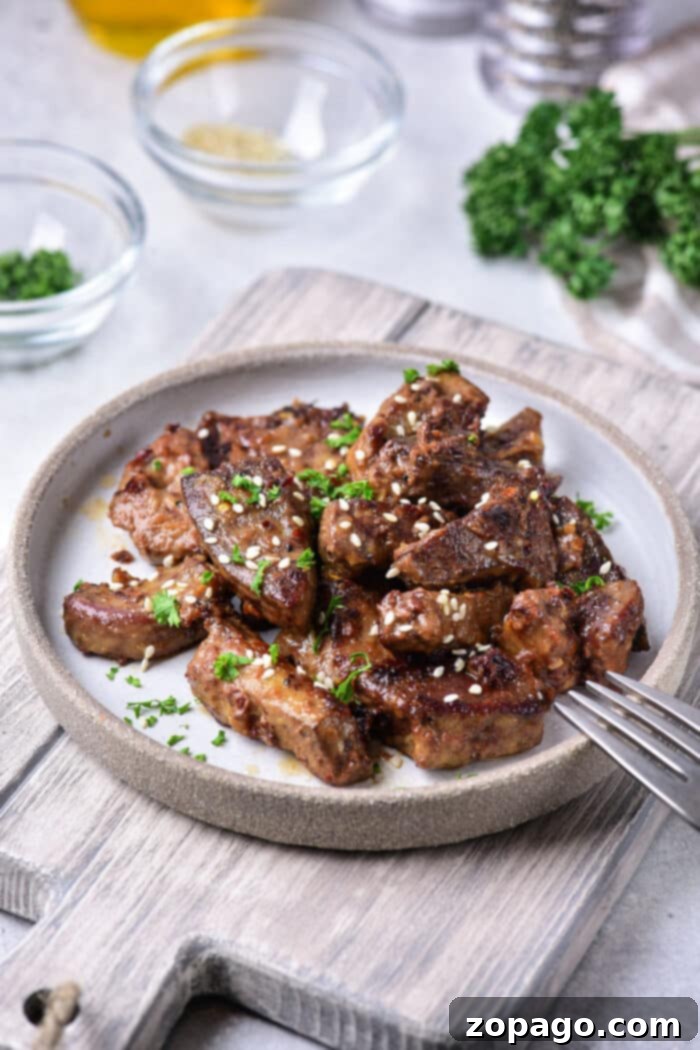 Delicious Pork Liver: Easy Recipes & Expert Tips 2 pan-fried pork liver with a side of rice
