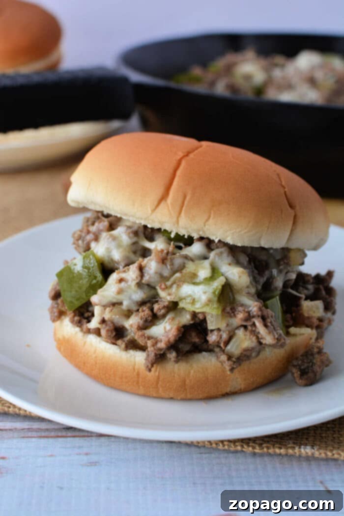 Philly Joe Beef Melt 6 Delicious Slow Cooker Philly Cheesesteak Sloppy Joes on buns.