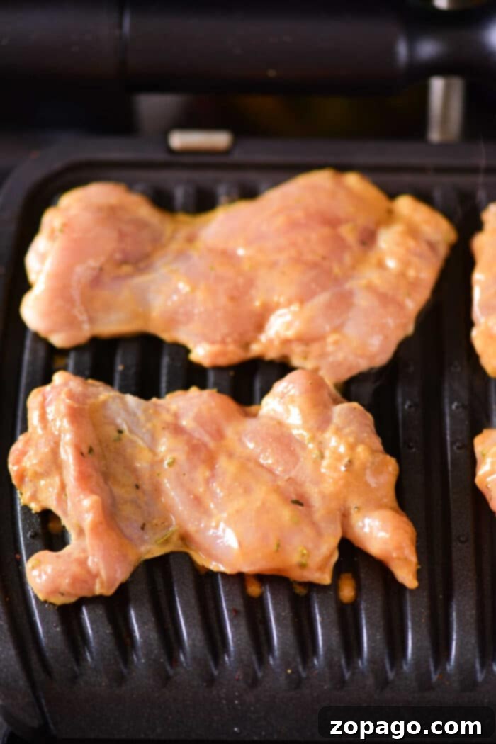 Perfect Grilled Chicken Thighs 5 Grilling Boneless Chicken Thighs for optimal juiciness