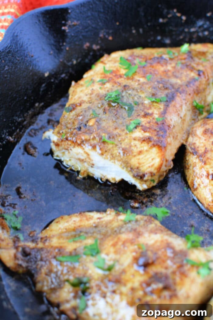 Pan-Seared Cast Iron Chicken Breast 6 Chicken Pieces in Cast Iron Skillet with garlic butter