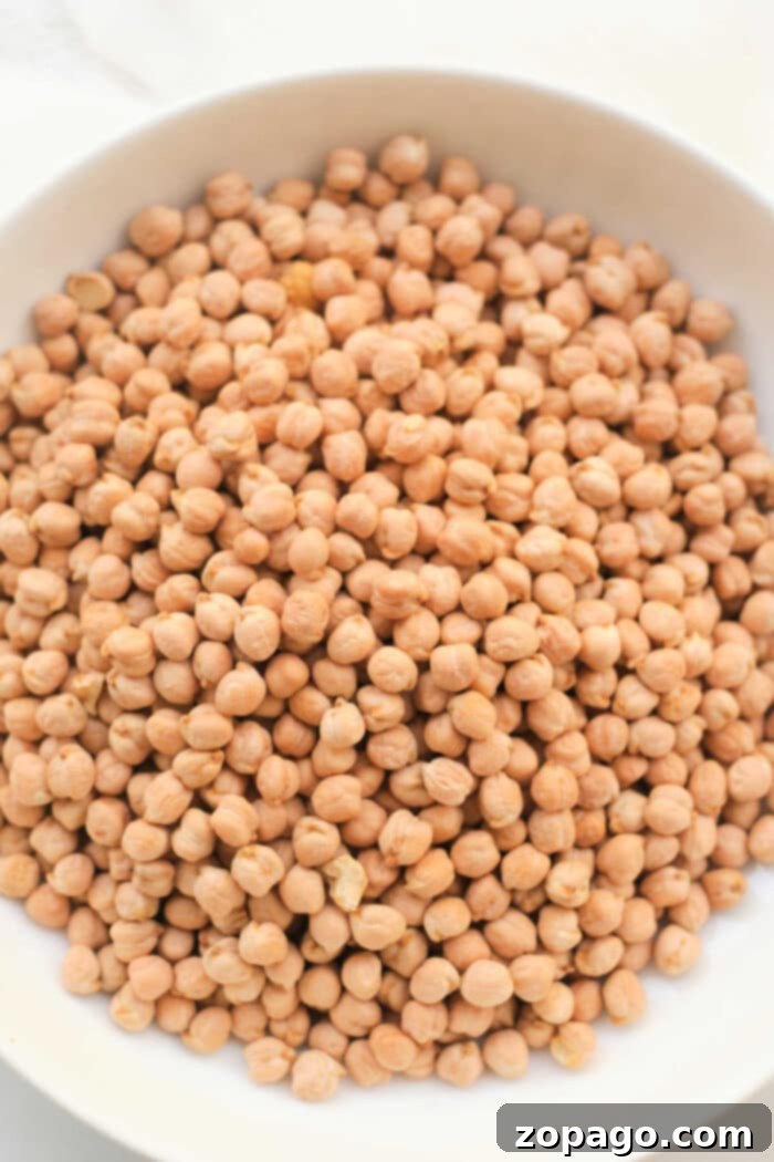 How to Cook Chickpeas – a bowl of tender, perfectly cooked chickpeas.