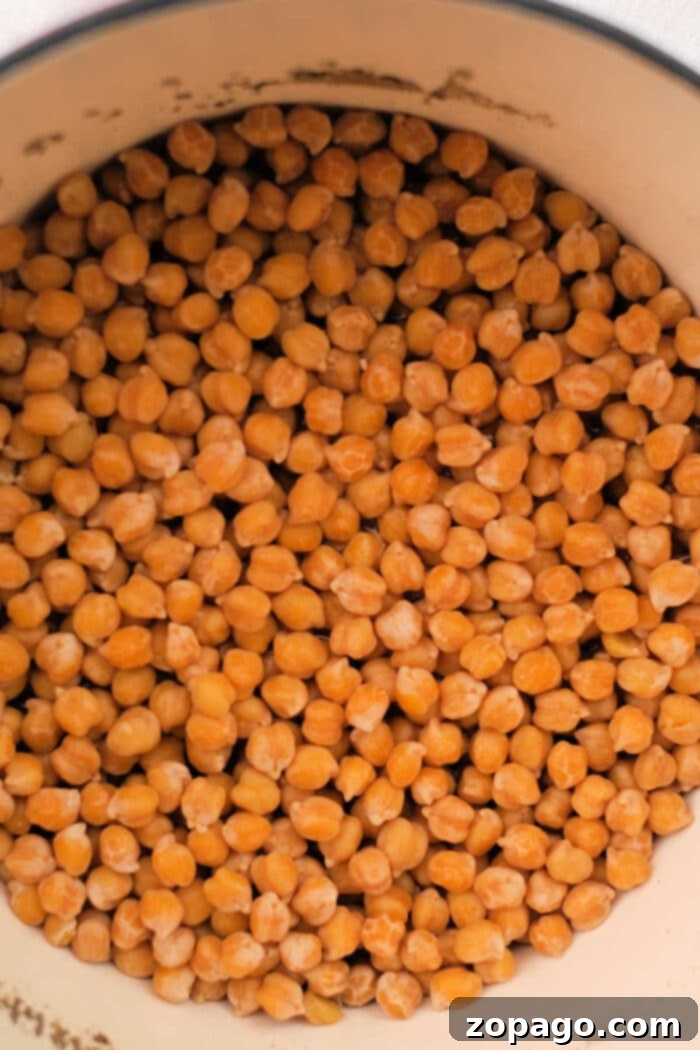 How Long to Cook Soaked Chickpeas – a close-up of tender, perfectly cooked chickpeas in a bowl, showcasing their ideal texture.