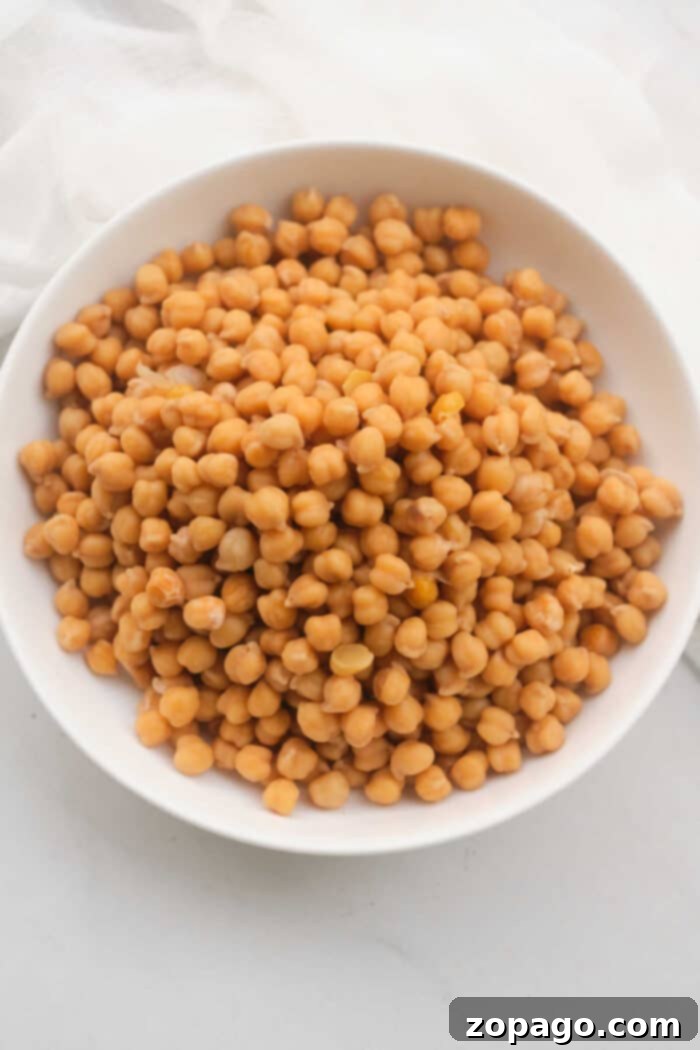 How to cook Soaked Chickpeas in Pressure Cooker – A generous serving of tender chickpeas cooked in a pressure cooker.