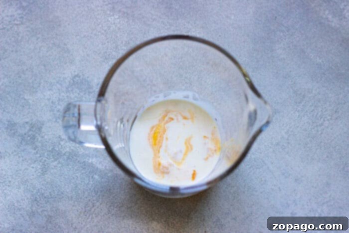 Spiced Pumpkin Cold Foam 3 Close-up of creamy sweet cream cold foam in a glass