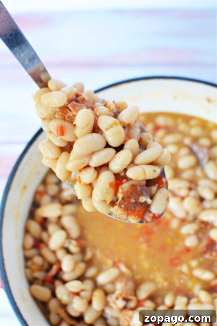 Delicious Peruvian Beans, Simplified 7 A spoonful of rich white Peruvian beans lends an authentic touch to this hearty dish.