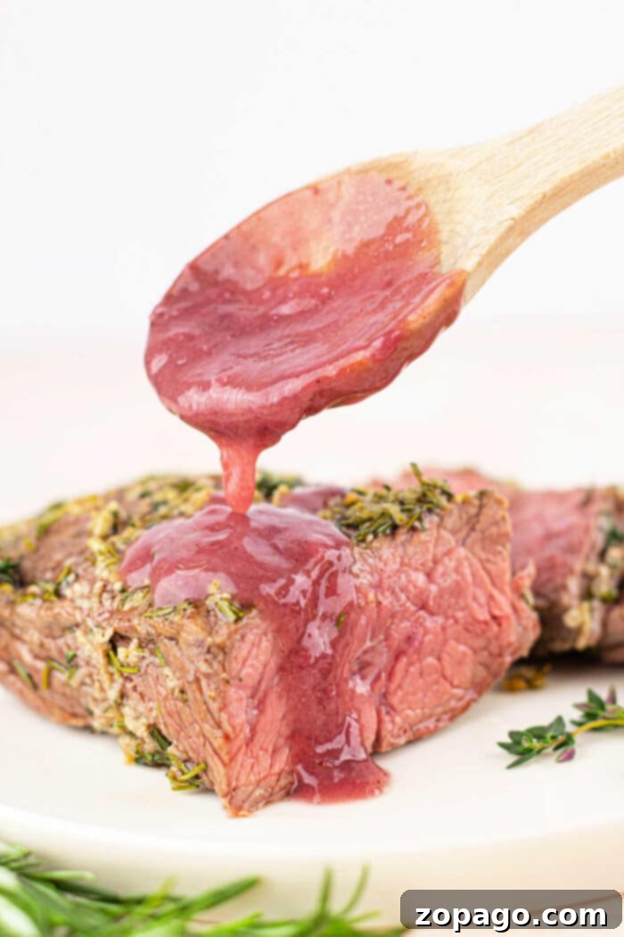 Savory Bottom Round Roast 8 Bottom Round Roast Beef, perfectly cooked and rested on a cutting board