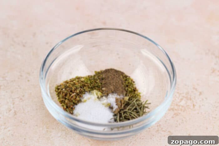 Tender Bottom Round Roast Made Easy 3 Bottom Round Roast being generously seasoned with a homemade dry rub blend.