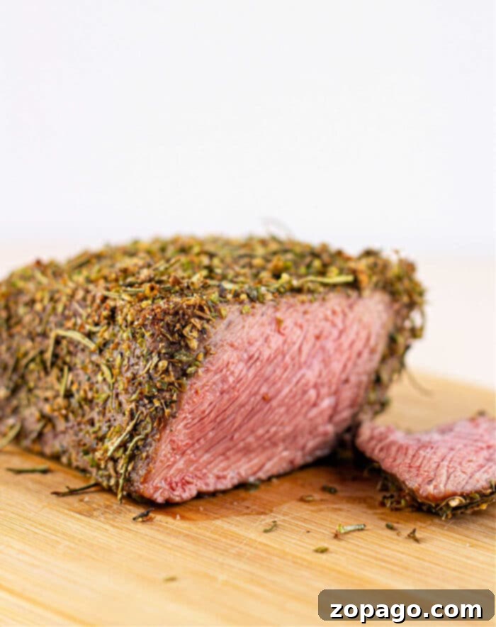 Tender Bottom Round Roast Made Easy 6 Bottom Round Roast with a savory dry rub, sliced and ready for serving.