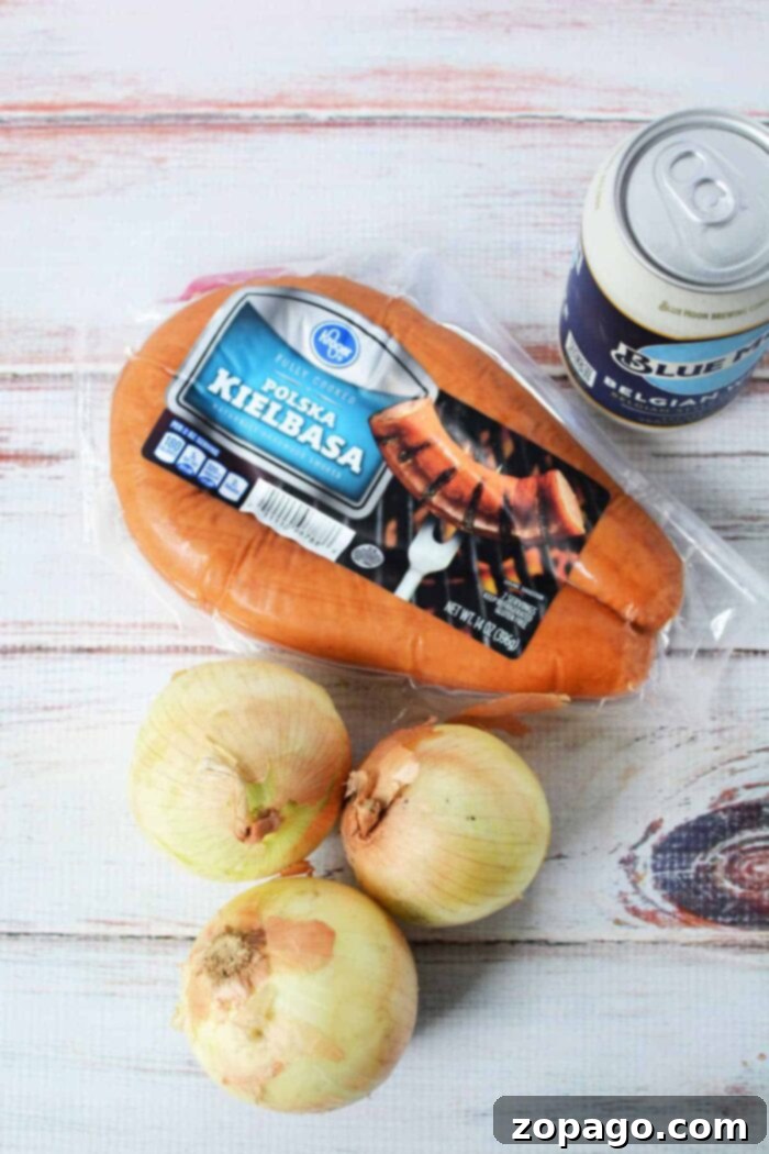 Set It and Forget It Kielbasa 3 Delicious Kielbasa with onions simmering in a rich beer sauce