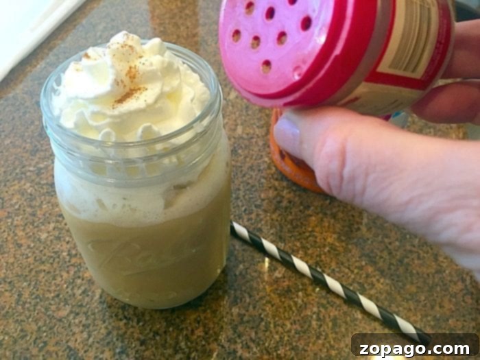 Creamy Pumpkin Spice Blend 9 Step-by-step image showing how to blend a DIY pumpkin spice frappuccino in a blender