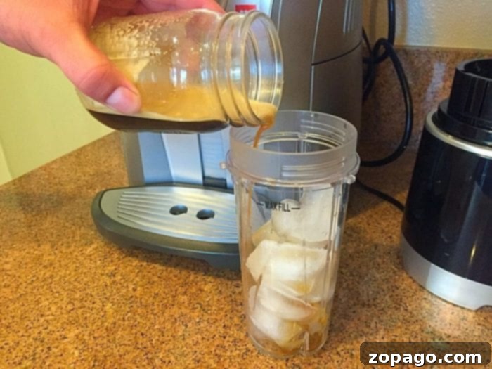 Creamy Pumpkin Spice Blend 4 Ingredients for making a homemade frappuccino laid out on a table
