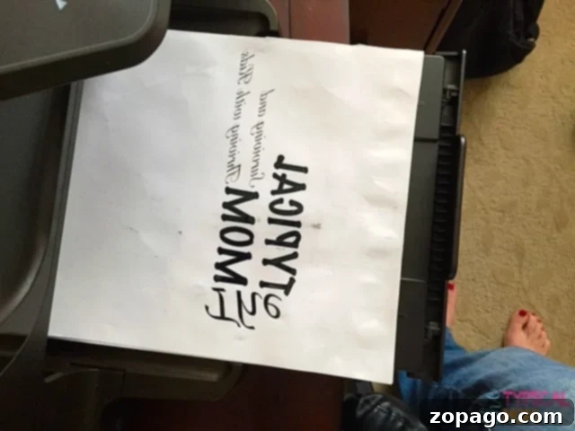 This image shows the correctly printed, backward design on freezer paper, prepared for image transfer. The freezer paper after printing, showing the mirrored design ready for transfer.