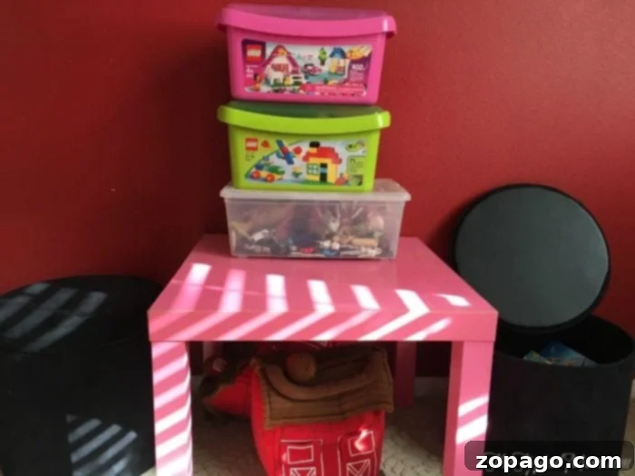 Taming Toy Chaos: Kid Room Organization & Rotation 3 A child happily playing with building blocks in a neatly organized room, showcasing the benefits of rotating toys to enhance focus and engagement.