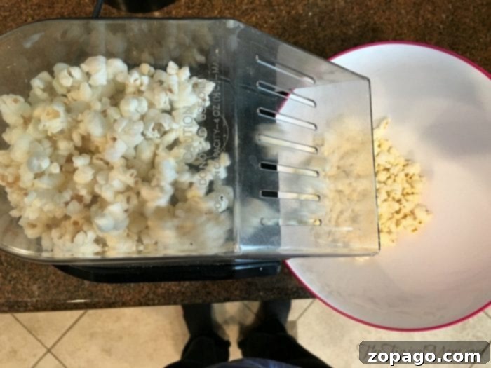 Decadent Peanut Butter Chocolate Popcorn 2 Freshly air-popped popcorn, ready for the peanut butter and chocolate drizzle.
