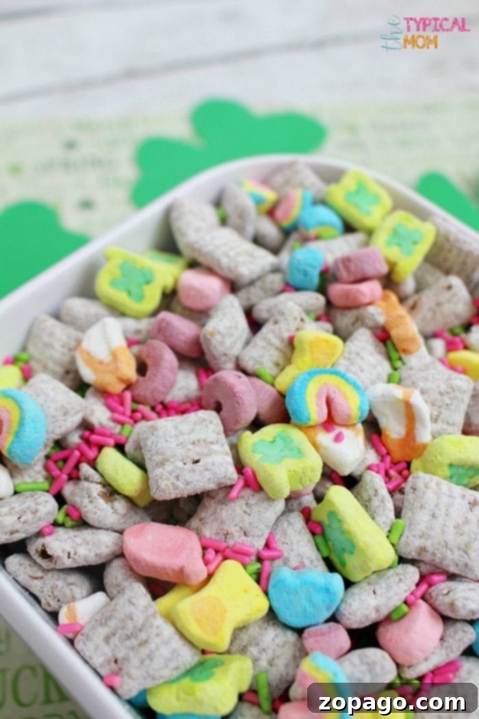 Muddy buddies recipe that is great for a party or gift idea. Add mix ins for every holiday like this one for St.Patrick's Day or any other holiday. Muddy buddies recipe for St. Patrick's Day with green sprinkles and candies.