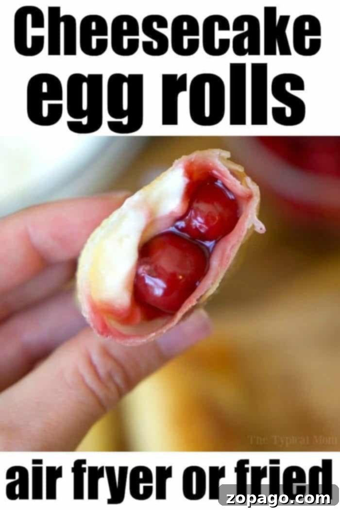 Golden Cherry Cheesecake Rolls 3 Close-up of a hand holding a cherry cheesecake egg roll filled with cream cheese and cherries, with the text "Cheesecake egg rolls air fryer or fried" written above and below the image.
