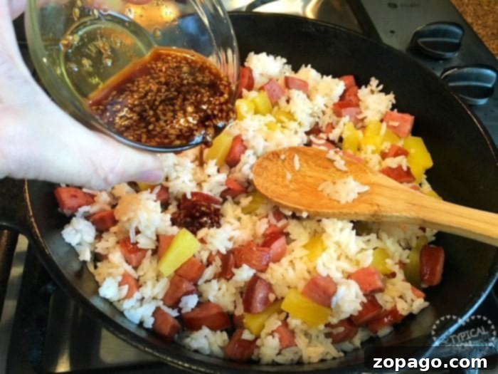 Quick and delicious skillet recipe, perfect for a weeknight dinner. Close-up of a skillet meal, possibly a lettuce wrap filling, cooking.
