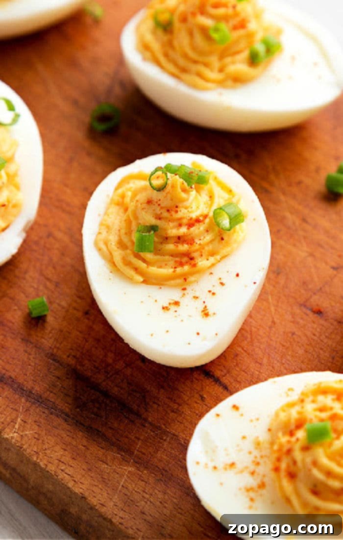 BEST deviled eggs ever with a hint of dill!! I have a few secrets to making the perfect hard boiled and deviled eggs right here! easy deviled egg recipe