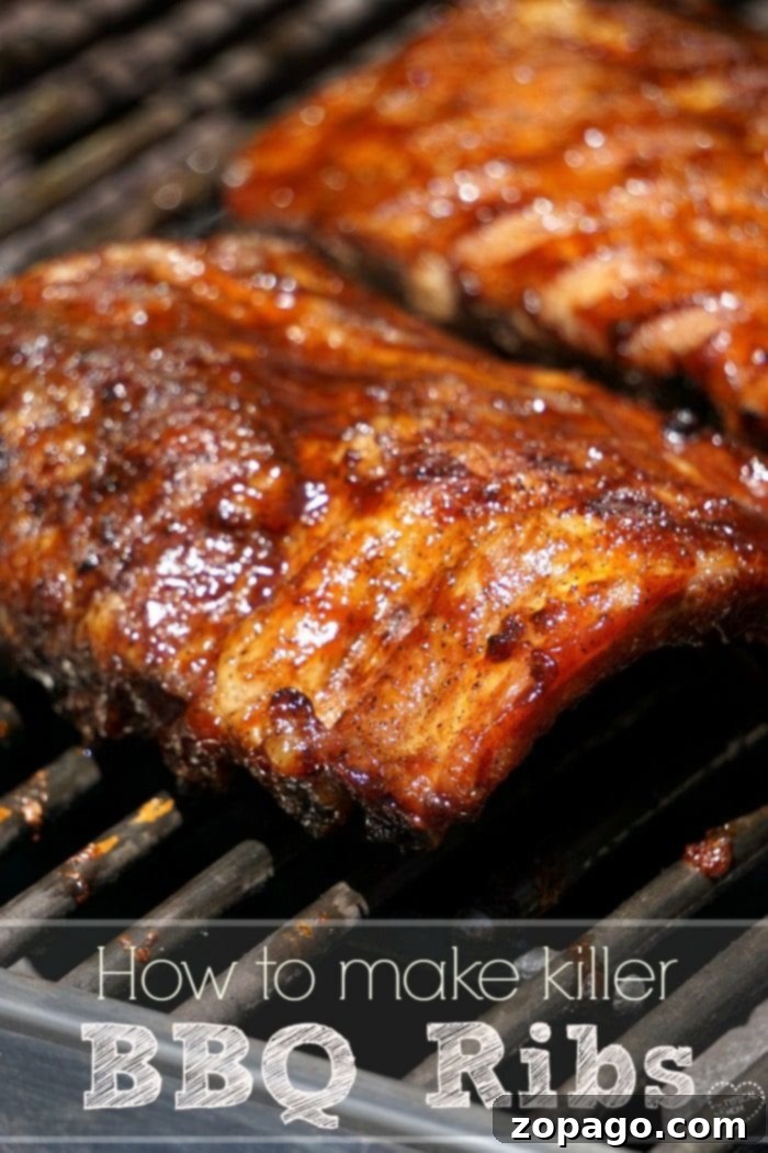 The ultimate barbecue ribs recipe for smoky, tender, and delicious grilled pork ribs. Close-up of perfectly grilled barbecue ribs, glazed with sauce and ready to serve.