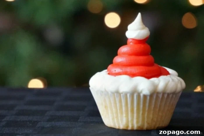 Santa cupcakes are fun and easy to make at Christmas! Find these and how to make Christmas tree cupcakes too here. Fun holiday activities for kids solved. #santa #santaclaus #christmas #cupcakes #dessert Santa cupcakes are fun and easy to make at Christmas! Find these and how to make Christmas tree cupcakes too here. Fun holiday activities for kids solved. #santa #santaclaus #christmas #cupcakes #dessert