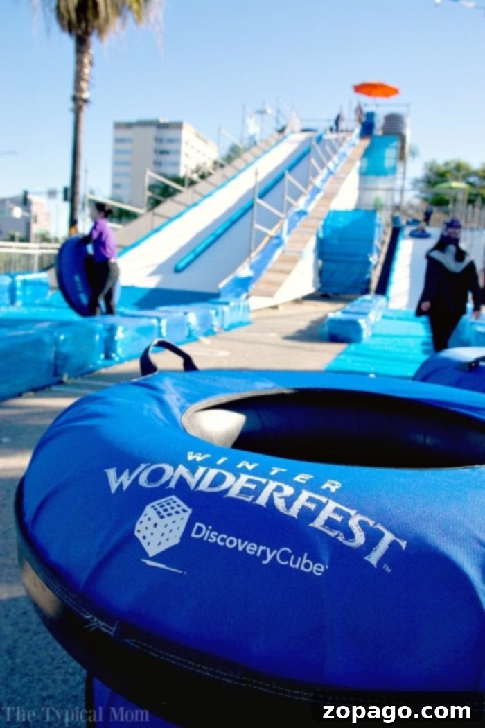 Discovery Cube OC Winter Wonderfest is a great event in Orange County California and offers snow outside this children's museum too. Discovery Cube OC Winter Wonderfest features snow play, tubing, and festive activities for families in Orange County, California